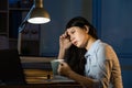 Asian business woman drink coffee refreshing working overtime la Royalty Free Stock Photo