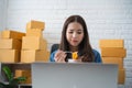 Asian business woman eating noodle at work for lunch time with unhappy face Royalty Free Stock Photo