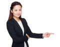 Asian business woman with finger point to indicate Royalty Free Stock Photo