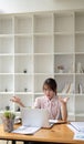 Asian business woman got stressed at work during in the office room, stressed face while working Royalty Free Stock Photo