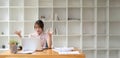 Asian business woman got stressed at work during in the office room, stressed face while working Royalty Free Stock Photo