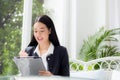 Asian business woman holding clipboard folder and gesture glad. Royalty Free Stock Photo