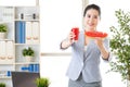 Asian business woman know concentrate fruit juice is not fresh