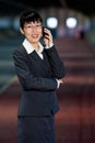 Asian business woman with mobile phone Royalty Free Stock Photo