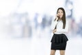 Asian business woman office worker communicating with mobile phone. Royalty Free Stock Photo