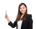 Asian business woman with pen point out Royalty Free Stock Photo