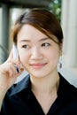 Asian business woman with phone Royalty Free Stock Photo