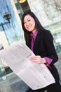 Asian Business Woman Reading Newspaper Royalty Free Stock Photo