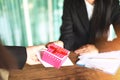 Asian business woman receiving salary bonus money and gift Box from boss or manager at office happily - Yearly Bonus concept for Royalty Free Stock Photo