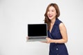 Asian business woman showing blank laptop computer screen over white background Royalty Free Stock Photo