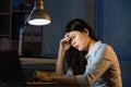 Asian business woman sleepy working overtime late night Royalty Free Stock Photo