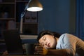 Asian business woman sleepy working overtime late night Royalty Free Stock Photo