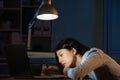 Asian business woman sleepy working overtime late night Royalty Free Stock Photo