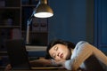 Asian business woman sleepy working overtime late night Royalty Free Stock Photo