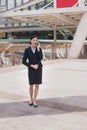 Asian business woman smile and hold cell phone to talk about business success Royalty Free Stock Photo