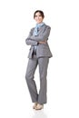 Asian business woman standing, smiling at camera Royalty Free Stock Photo