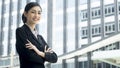 Asian business woman stands with confident posting at outdoor pu Royalty Free Stock Photo