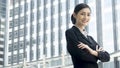 Asian business woman stands with confident posting at outdoor pu Royalty Free Stock Photo