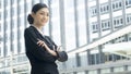 Asian business woman stands with confident posting at outdoor pu Royalty Free Stock Photo