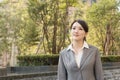 Asian business woman thinking in the city Royalty Free Stock Photo