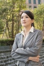 Asian business woman thinking in the city Royalty Free Stock Photo