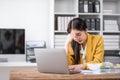 asian business woman thinking solving problem at work, worried serious young asian woman concerned make difficult Royalty Free Stock Photo