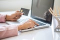 Asian business woman using laptop for online shopping. Royalty Free Stock Photo