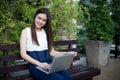 Asian business women using notebook for working at outdoor Royalty Free Stock Photo