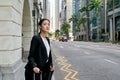 Asian business woman waiting for taxi cab Royalty Free Stock Photo