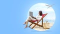 Asian business woman working with laptop sitting in the beach chair Royalty Free Stock Photo