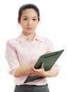 Asian business woman write on file pad Royalty Free Stock Photo