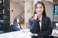 Asian business women and group using notebook for meeting and bu