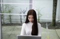 Asian business women typing keyboard insert data to laptop at office. Business people working at home with internet Royalty Free Stock Photo