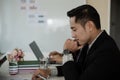 Asian businessman being business thinking. in conference room is