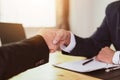 Asian businessman and businesswomen Handshaking.