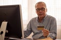 Businessman doing financial transactions by computer at the office room