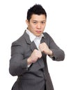 Asian businessman fighting