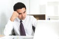 Asian businessman getting stressed at work Royalty Free Stock Photo