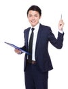 Asian businessman hold clipboard and pen up Royalty Free Stock Photo