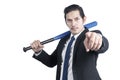 Asian businessman holding a baseball bat Royalty Free Stock Photo