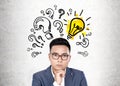 Asian businessman, ideas and questions Royalty Free Stock Photo