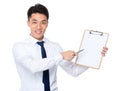 Asian businessman pen point to clipboard Royalty Free Stock Photo