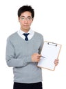 Asian businessman pen point to white paper of clipboard Royalty Free Stock Photo