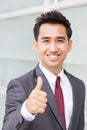 Asian businessman showing thumb up Royalty Free Stock Photo