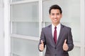 Asian businessman showing thumb up Royalty Free Stock Photo