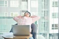 Asian businessman sleeping while working in living room at night Royalty Free Stock Photo