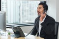 Asian businessman talking on telephone call at business workplace Royalty Free Stock Photo