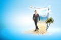 Asian businessman walking on the beach Royalty Free Stock Photo