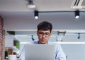 Asian businessman woking with laptop and paper work on desk at office.digital workflow online business lifestyle concept