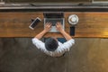 Asian businessman working at cafeteria with his laptop Royalty Free Stock Photo